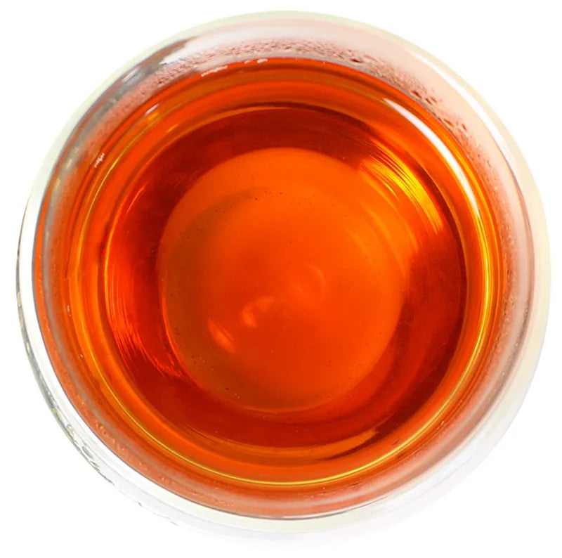 Brewed tea is an amber color in the cup